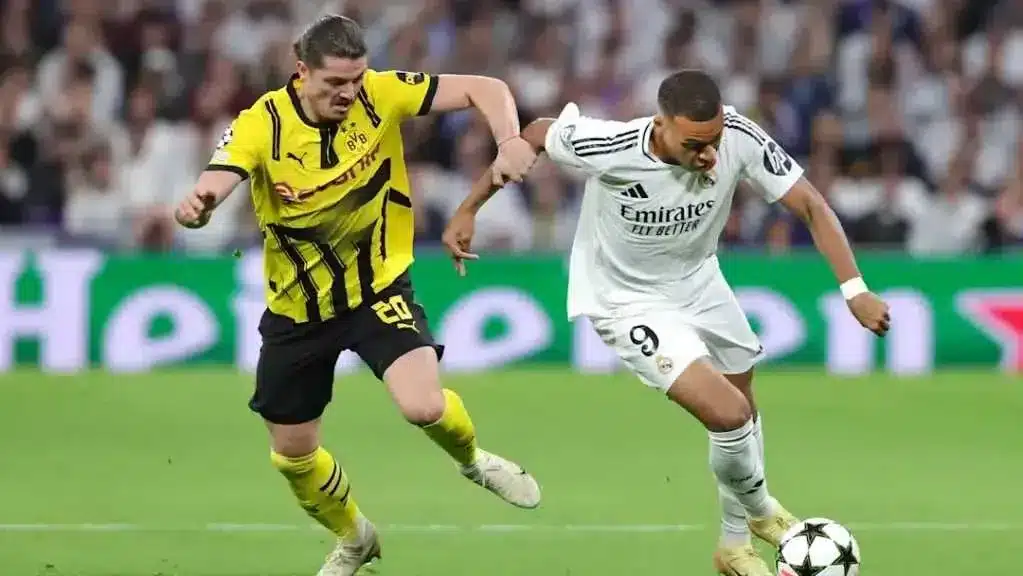 "ريال مدريد يتأهل لنصف النهائي بعد فوز مثير على دورتموند"